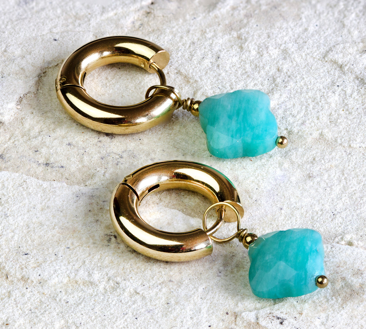 Gold-plated earrings featuring a raw turquoise nugget dangling from a simple hoop, merging raw beauty with classic style, with Nairobi delivery #gorgeouseveryday
