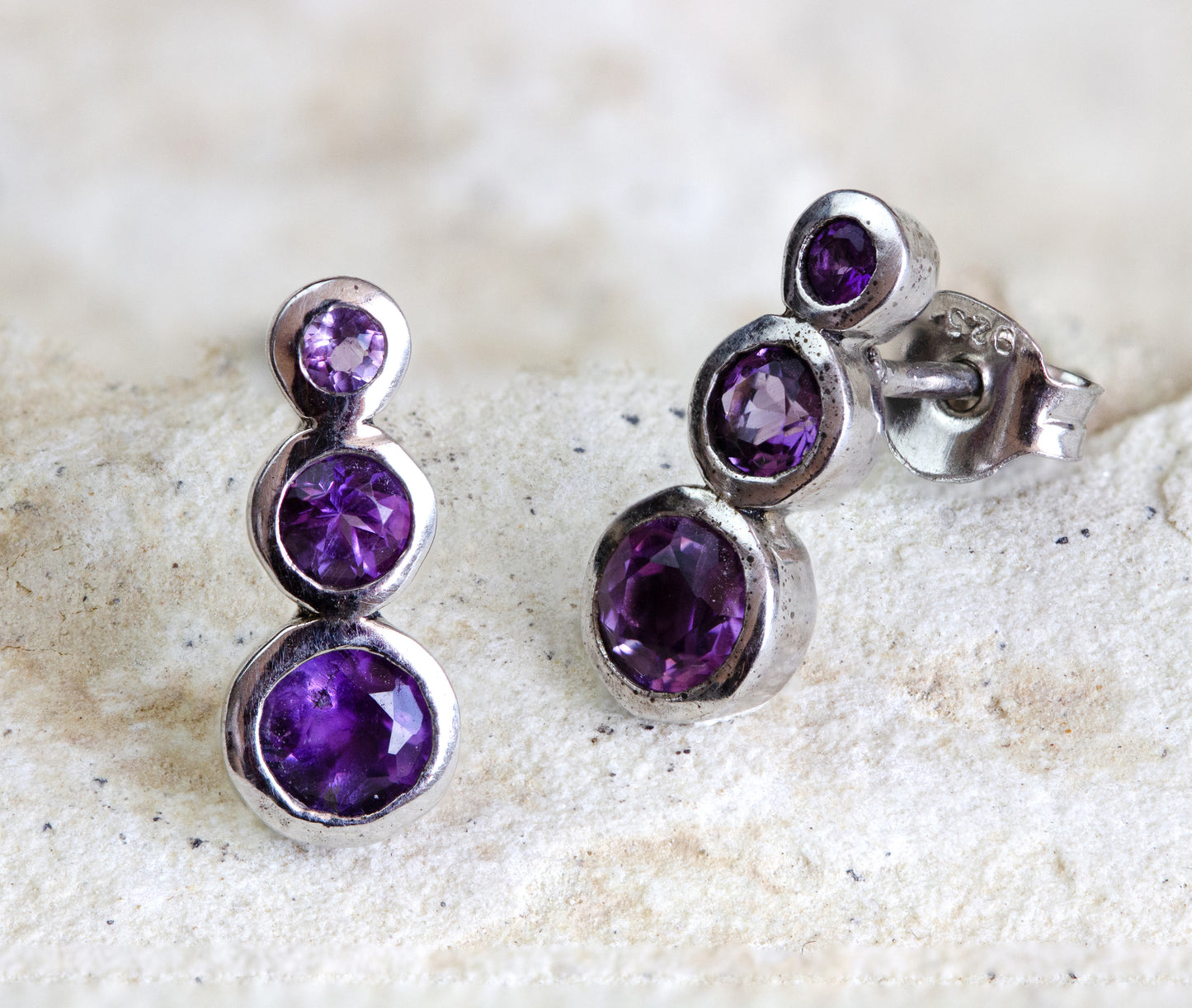 Sterling silver earrings with three graduated round purple gems, a classic and regal accessory, delivered in Nairobi #gorgeouseveryday