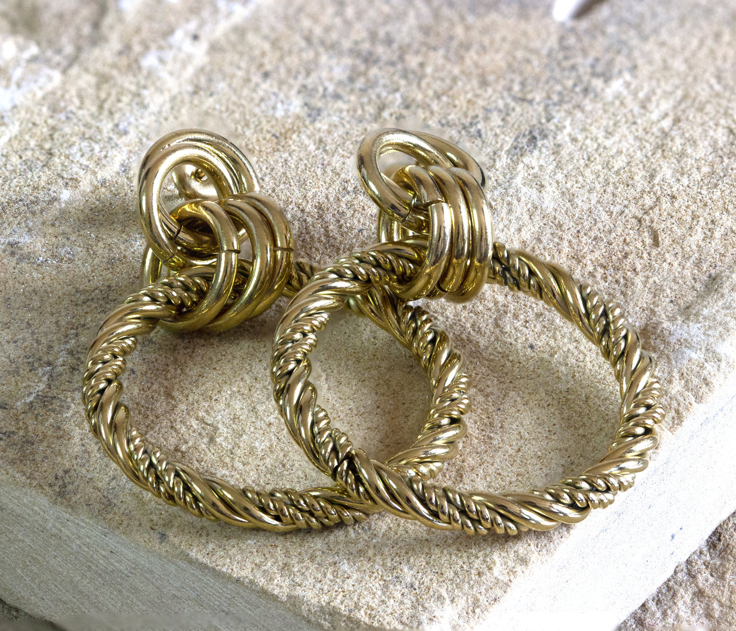 Make a statement with Dahlia Jewels' gold-plated knotted hoop earrings, showcasing a unique twisted design for an eye-catching effect. Enjoy jewelry with the convenience of free delivery in Nairobi. #gorgeouseveryday