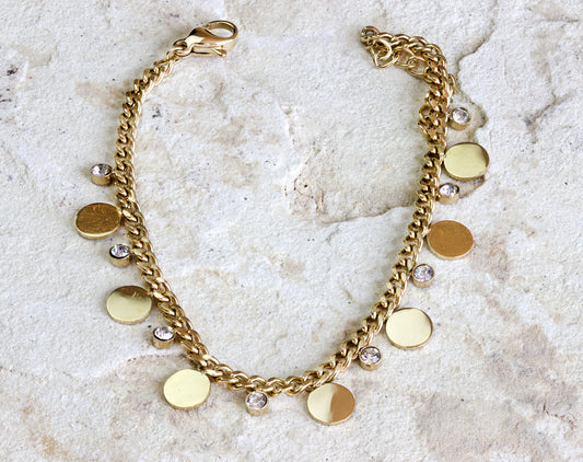 A chic and trendy piece, this gold-tone bracelet from Dahlia Jewels, featuring coin and crystal charms, is versatile for day-to-night wear. Enjoy this jewelry with the convenience of free delivery in Nairobi.