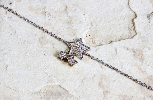 Dahlia Jewels presents a sterling silver necklace with sparkling star pendants, creating a constellation around your neck. A perfect blend of whimsy and elegance, with free jewellery delivery in Nairobi.