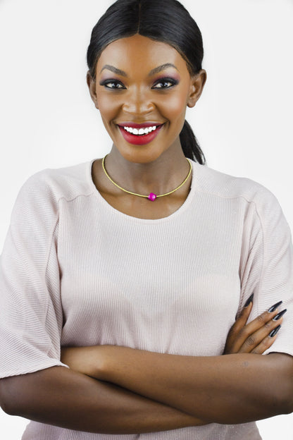 Dahlia Jewels brings you the epitome of elegance with their sleek gold choker and vibrant pendant. Enjoy free jewellery delivery in Nairobi!