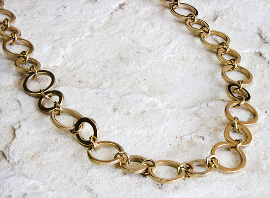 Bold gold-plated link chain necklace, a statement piece from Dahlia Jewels, offering free delivery in Nairobi, ideal for adding a touch of luxury to any outfit, #gorgeouseveryday.