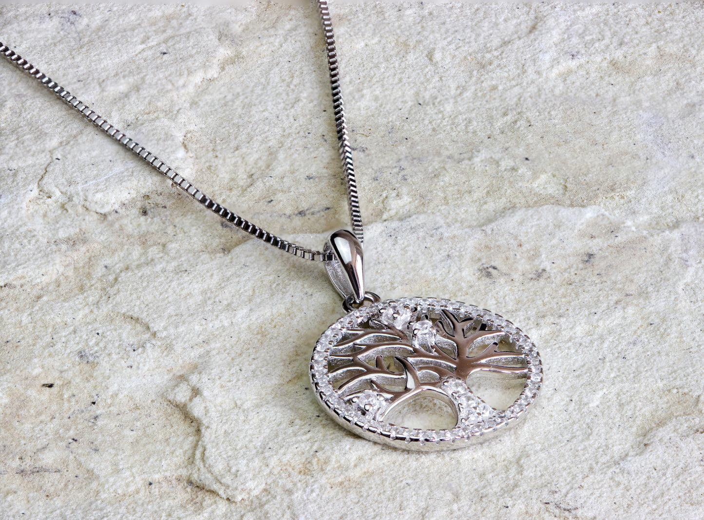 Sterling silver necklace with tree of life pendant encrusted with sparkling stones, Dahlia Jewels, an emblem of growth in your jewellery/jewelry collection, #gorgeouseveryday.