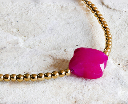 Classic gold-plated beaded necklace with a single bold magenta stone, Dahlia Jewels brings sophistication to your jewellery/jewelry collection, free delivery in Nairobi, #gorgeouseveryday.